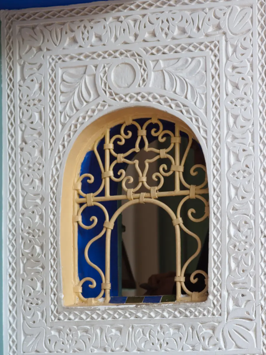 A Majorelle-blue arched door in Marrakech